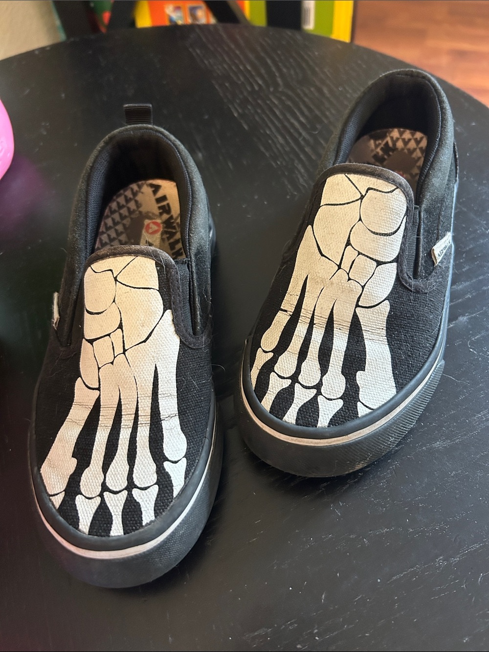 Airwalk Kids Black Slip-On Sneakers with White Skeleton Foot Print